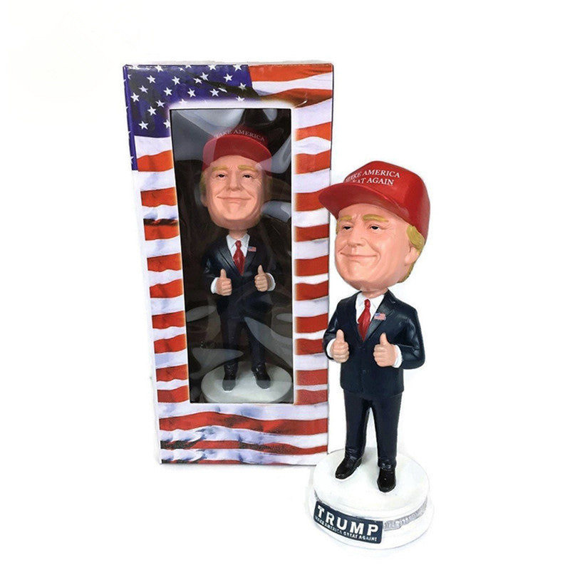 Resin manufacturers customized celebrity guitar doll car decoration spring shaking head model hand gift